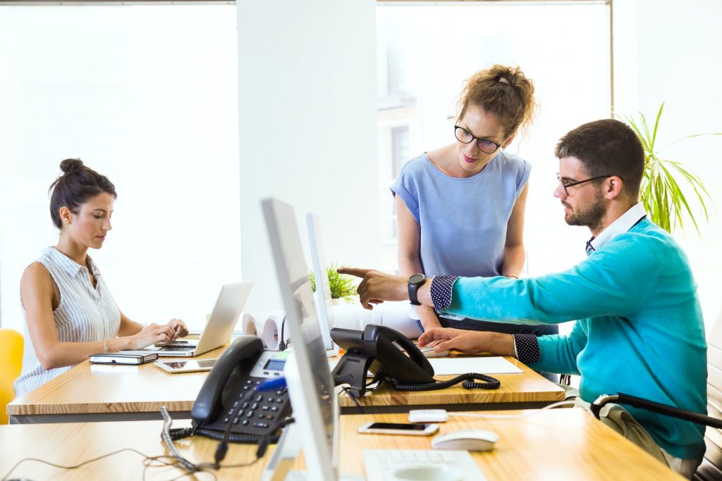 Group of business people working in modern office.